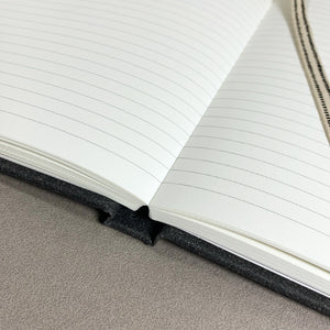 Recycled leather layflat notebook